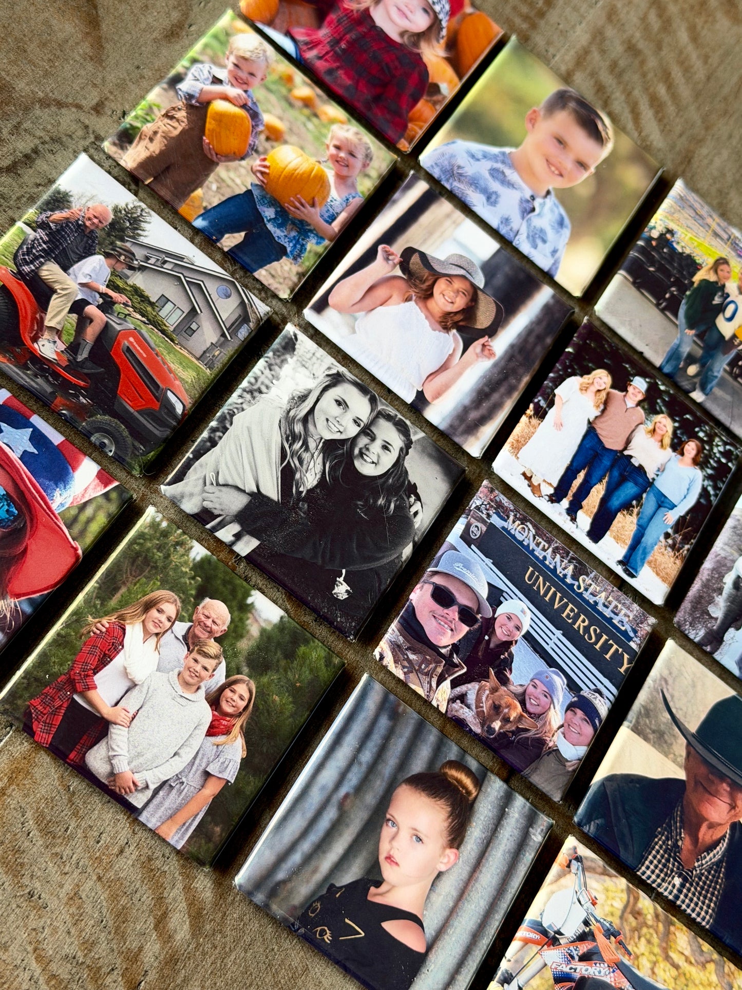 Set of 24 - 2'" square refrigerator magnets with images.